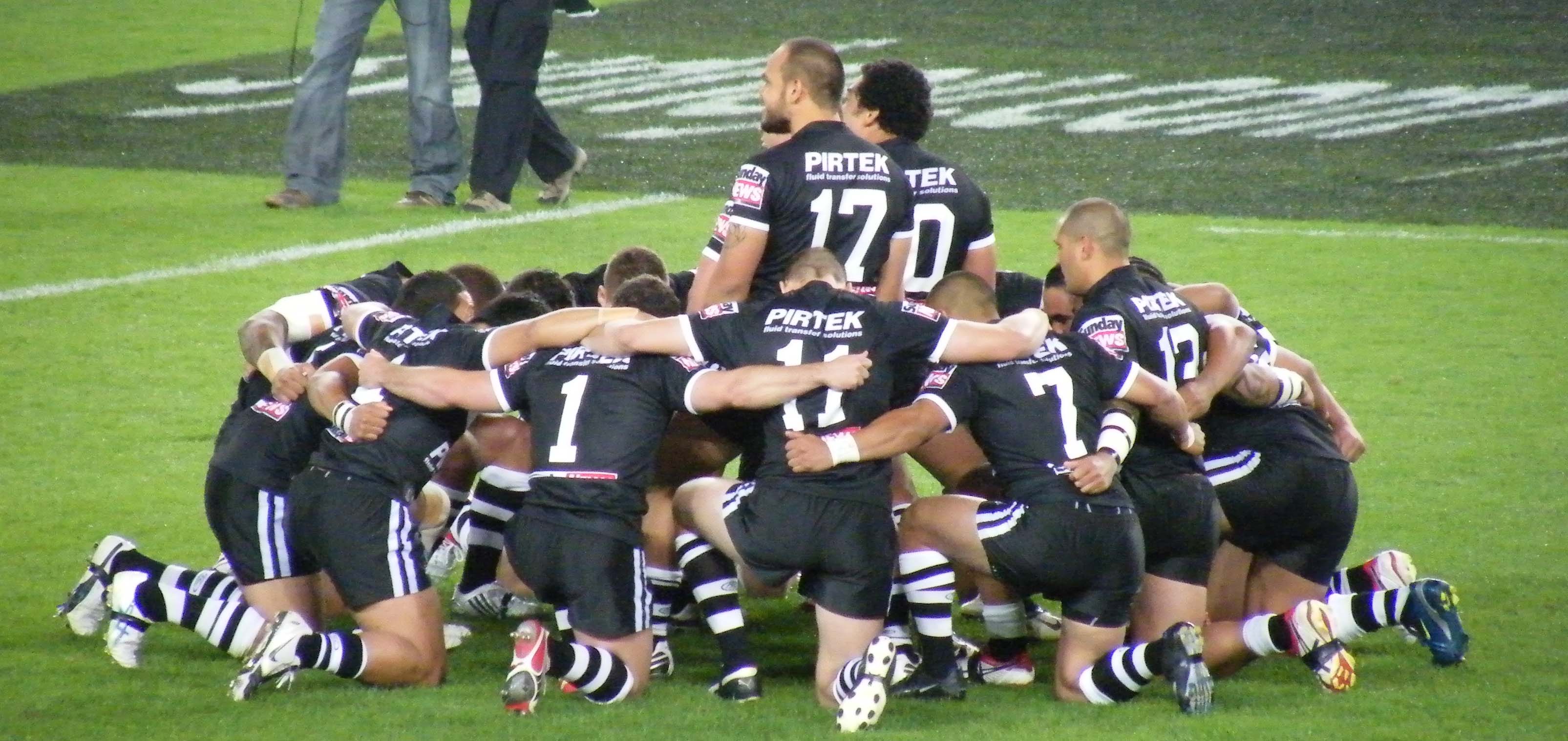 Rugby team huddle